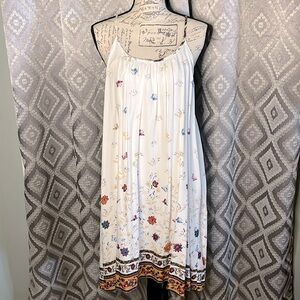 Hem & Thread, bohemian style strapping back white floral dress. Gently used.